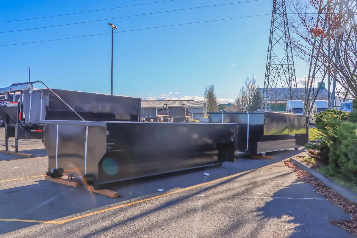 Roll-off dumpster ready for waste disposal at job site for 3 Yard Dumpster Rental in Sparta